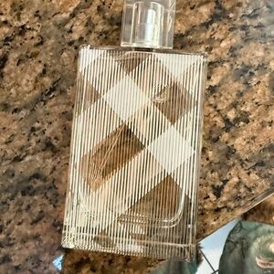 Burberry Gold and White Striped Perfume Bottle